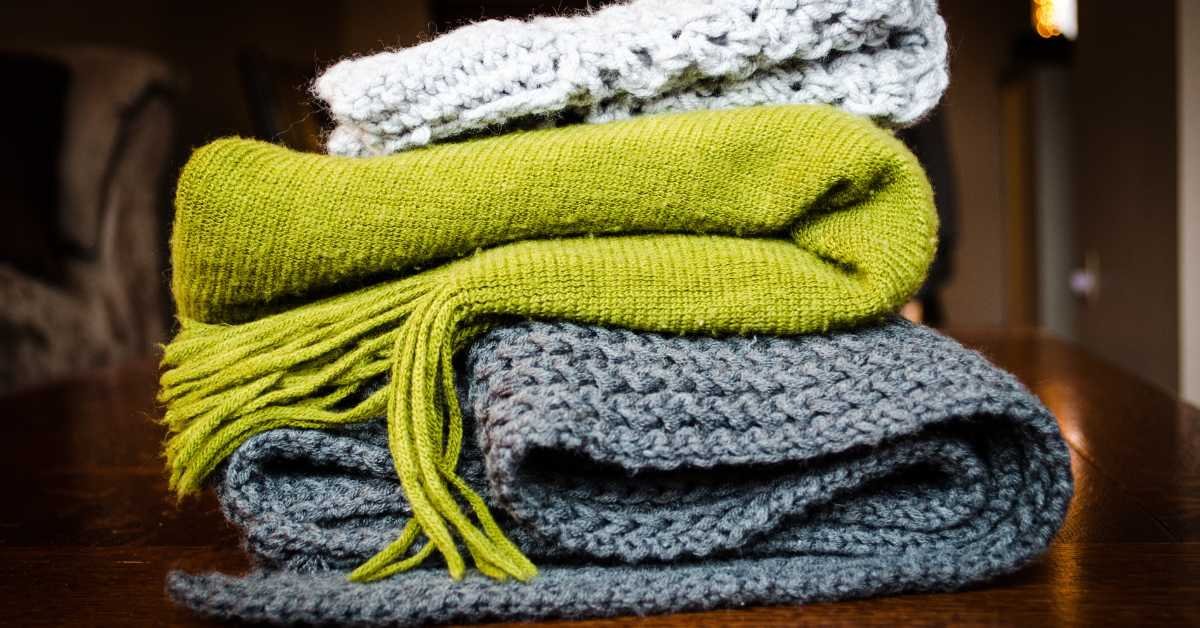 blankets stored under bed box