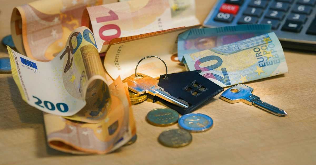 table cluttered with small items keys coins cables