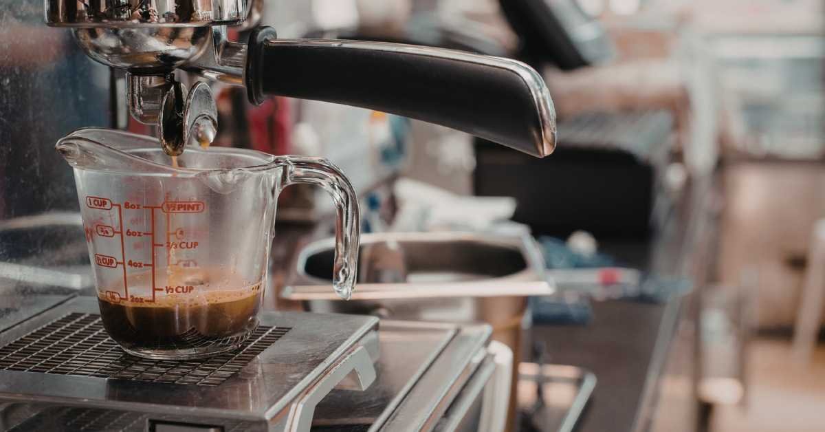 clean kitchen counter while coffee brewing morning routine