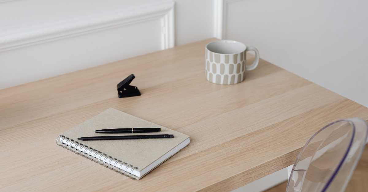 empty desk cleared surface before organizing 