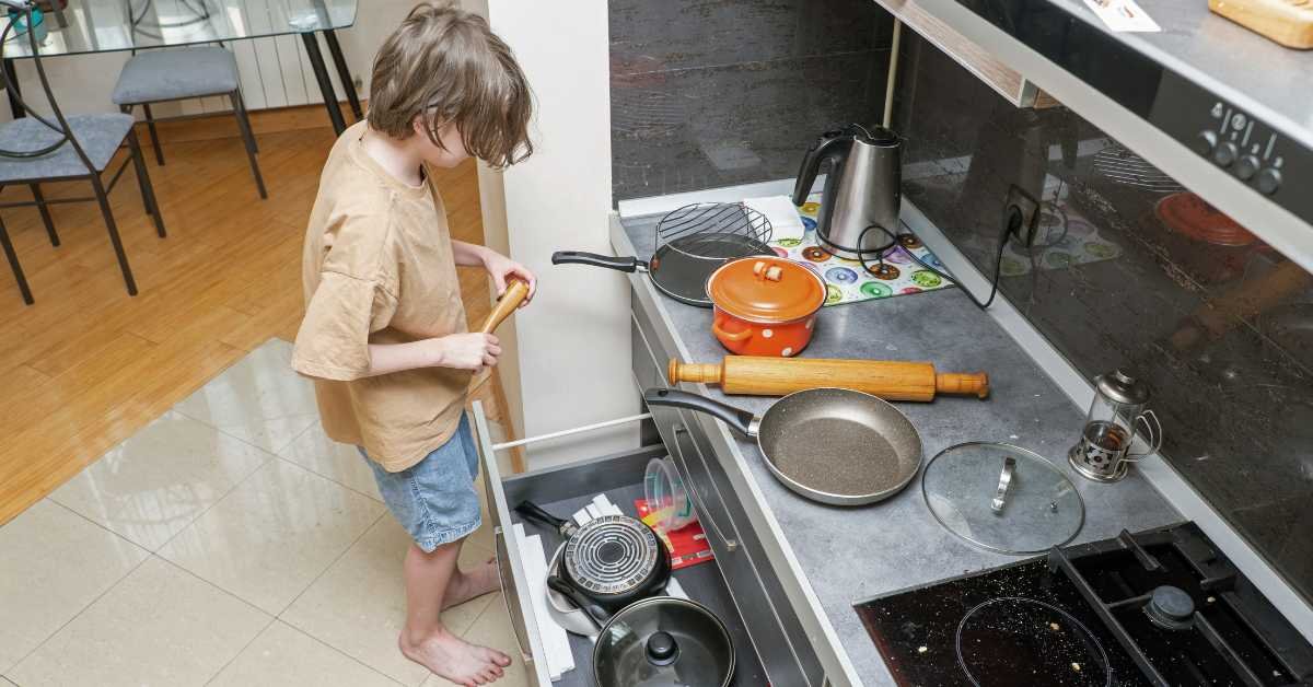 child helping with cooking simple kitchen task