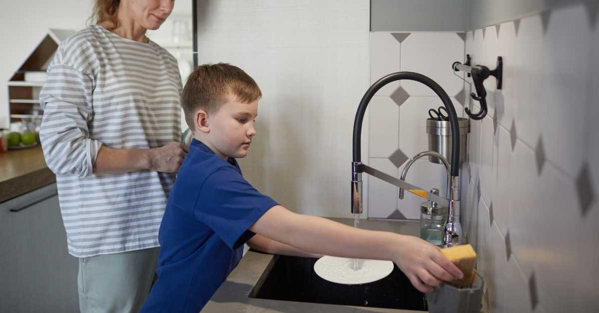 child helping cook kitchen following steps
